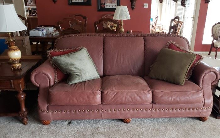 Three cushion brown leather sofa