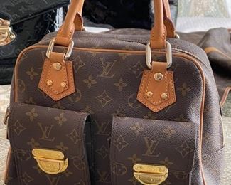 Louis Vuitton Monogram Manhattan PM purse 12in. X 9in. X 4.5in.