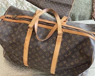 Louis Vuitton duffel bag 22in. X 10.5in x 12in