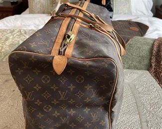 Louis Vuitton duffel bag 22in. X 10.5in x 12in