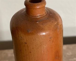 Antique Unmarked Stoneware Bottle	11.75in H x 3.25in Diameter	
