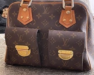 Louis Vuitton Monogram Manhattan PM purse	12in. X 9in. X 4.5in.