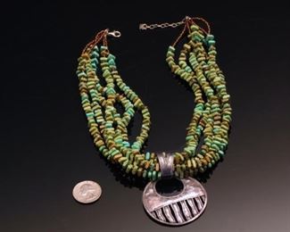 6 Strand Turquoise and copper beaded Necklace with Silver Pendant	20 inches	
