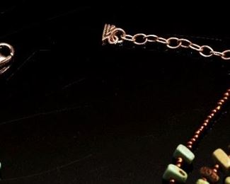 6 Strand Turquoise and copper beaded Necklace with Silver Pendant	20 inches	