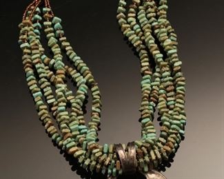 6 Strand Turquoise and copper beaded Necklace with Silver Pendant	20 inches	