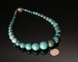 Sterling Silver graduated Turquoise beaded necklace	19.5 inches	