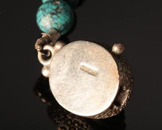 Sterling Silver graduated Turquoise beaded necklace	19.5 inches	