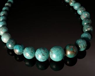 Sterling Silver graduated Turquoise beaded necklace	19.5 inches	