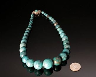 Sterling Silver graduated Turquoise beaded necklace	19.5 inches	