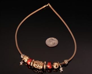 14K Yellow Gold 18” Charm Necklace	18 inch with varying sized charms