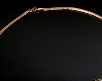 14K Yellow Gold 18” Charm Necklace	18 inch with varying sized charms