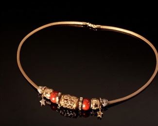 14K Yellow Gold 18” Charm Necklace	18 inch with varying sized charms