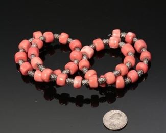 Native American Coral and Silver Wrap Bracelet	1.5 inches wide on wrist