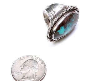 Vintage Native American Turquoise and Silver Ring	1 1/4 inch stone with silver border	