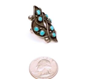Native American 8 stone turquoise and silver ring	1.5 inches long