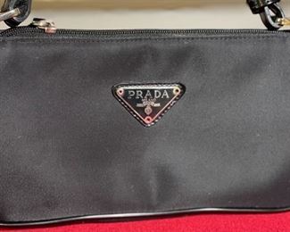 Authentic Sm Prada Clutch Purse in box	5x9.5x2.5in	HxWxD