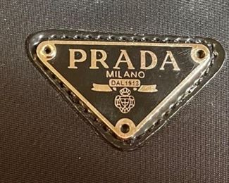 Authentic Sm Prada Clutch Purse in box	5x9.5x2.5in	HxWxD