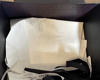 Authentic Sm Prada Clutch Purse in box	5x9.5x2.5in	HxWxD