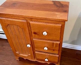Cute mini storage cabinet.  Great for hiding all the Tupperware containers!