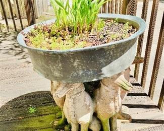 Planter on figural base