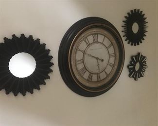 Much decorative decor and several style clocks