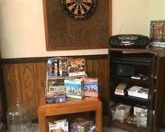 Puzzles and more puzzles...I think about 40 here. Most are 1000 piece puzzles; also, some 500 and 750 piece puzzles. 