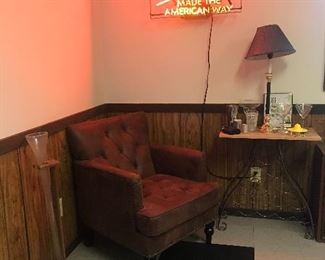 Miller sign, wine rack, beer by the yard glass w/stand and nice chair to sit back and relax in  