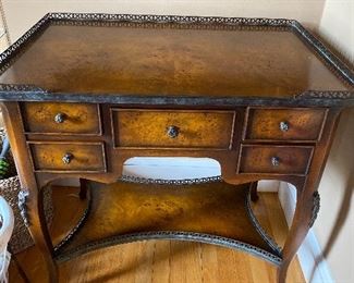 Wooden Accent Table with brass fender on top and bottom. light scratch on top, see next photo 32”L x 22”W x 30”T $325 - - NEW PRICE $275