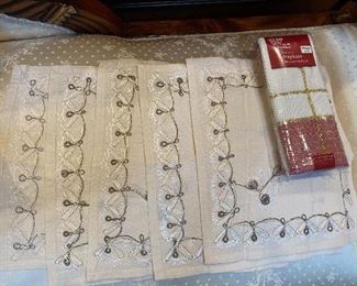 5 placemats $12; 4 napkins in package $8