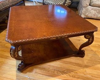 Square wooden coffee table with brass accents 39” x 39”; 19” high $425 