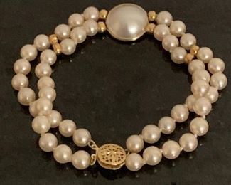 5 mm pearls bracelet 14 gold clasp  $100.00