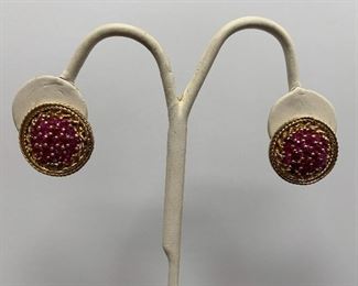 38 rubies with 14 k yellow gold clips appraisal $2400.00 our price to you $995.00