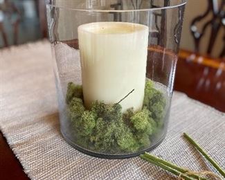 Pair of glass hurricanew w/ moss and candles