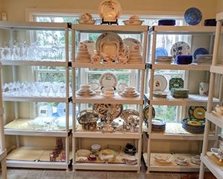 Several sets of china, glassware, silverplated hostess items and doodads. 