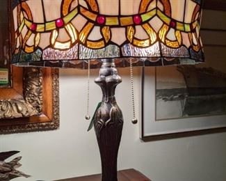 One of the pair of stained glass 2-light table lamps. 