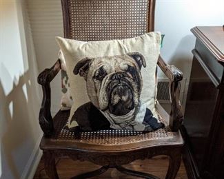 One of a pair of walnut/cane armchairs, with Belgian tapestry bulldog pillow, with down insert.