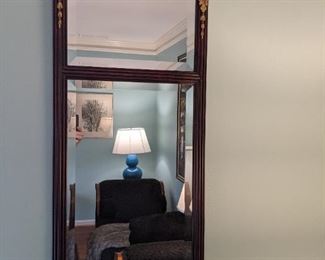 Empire-ish mahogany beveled glass wall mirror, with gold gilt detail.
