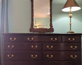 9-drawer Thomasville mahogany dresser, with antique, hand-carved mahogany/gold gilt wall mirror.