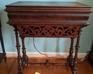 VERY cool antique dressing cabinet, hand carved details, hidden drawer and mirrored/compartmentalized interior. 