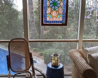 Bentwood rocker, blue glazed ceramic Asian garden stool (from Ballard Designs) and another stained glass hanging panel.