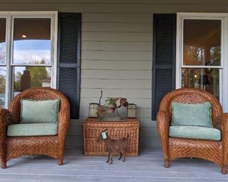 Wonderful pair of rattan armchairs, with green upholstered cushions, matching side table, metal dog planter (WOOF!) pair of metal/glass lanterns and horny ol' goat.