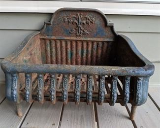 Wonderful patina on this cast iron fireplace insert - love the blue paint!