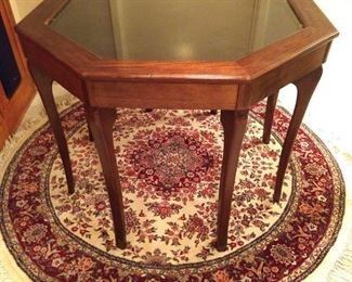 Here's something you won't see everyday - a custom made tilt-top mahogany curio/display table. 