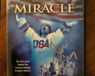 Signed by Team USA hockey player, Jim Craig.                        I don't know nuthin' 'bout sports, but here ya go:      James Downey Craig is an American former ice hockey goaltender who is best known for being part of the U.S. Olympic hockey team that won the gold medal at the 1980 Winter Olympics.