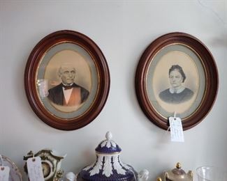 Adopt some relatives in beautiful oval walnut frames.