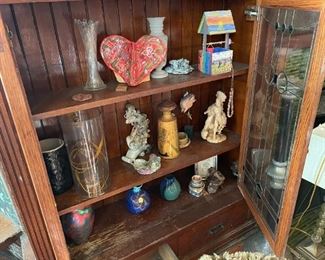 . . . a cabinet full of treasures -- pottery and such -- cabinet is a built in!