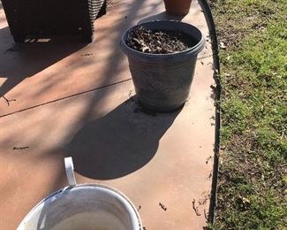 Several large outdoor planters 