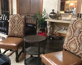 Beautiful studded leather , masculine carved bottom , side chairs.  With some Texas flair added! 