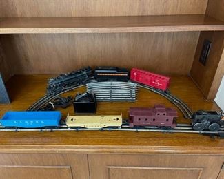 Antique Lionel O-Gauge 1666 Locomotive, tender, 3 rail cars, caboose, track and multi-control transformer