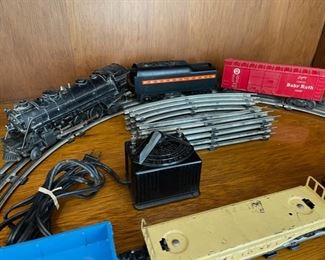 Antique Lionel O-Gauge 1666 Locomotive, tender, 3 rail cars, caboose, track and multi-control transformer
